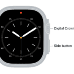 The front of Apple Watch Ultra, with the Digital Crown shown at the top on the right side of the watch and the side button shown at the bottom right.  