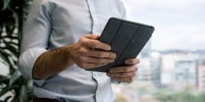 Person holding iPad Outdoors