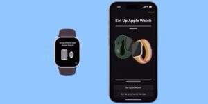 An Apple Watch being set up next to an iPhone