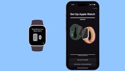 An Apple Watch being set up next to an iPhone  