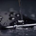 Water pouring onto an iPhone.