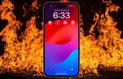 iPhone with fire in the background  
