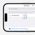 Selecting and dragging an audio file from the browser to the Tracks view in GarageBand.  