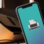 iPhone with a printer on background  