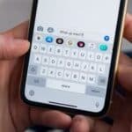 Photo of a person texting on the iPhone Messages app  