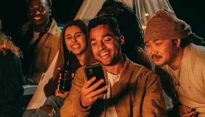Person Looking at Another Person's Phone