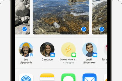 An iPhone showing the share sheet with photos selected and the AirDrop option displayed.  