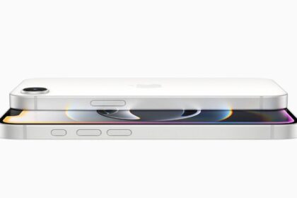 Two white iPhone 16 devices stacked on top of each other.
