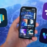 An iPhone 13 mini showing a wallpaper app surrounded by app icons.
