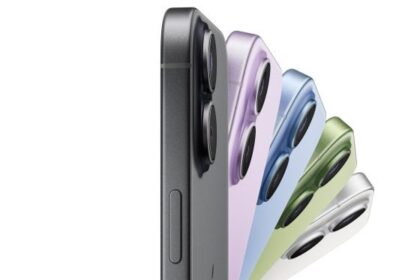iPhone 17 in black color spinning showcasing the front exterior with more iPhone 17 devices fanning out in different colors - black, lavender, mist blue, sage, white forming a fan shape  