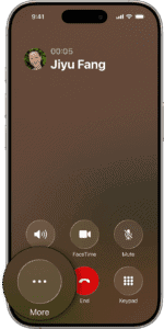 iPhone showing an active phone call, with the option to tap the More button.