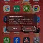 On home screen on iPhone, select Delete