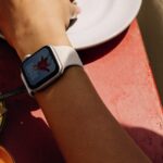 An image of a person wearing an Apple Watch SE 3 on their wrist.