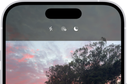The Camera screen in Photo mode. Within the viewfinder is a night scene. Buttons for Night and Camera Controls mode appear in the top-right corner of the screen. At the bottom of the screen are, from left to right, the Photo and Video Viewer button, Video and Photo Mode, and the Camera Chooser Back-Facing button.