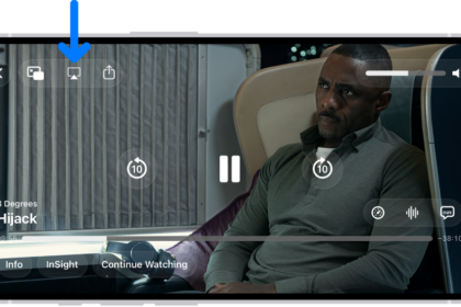 A movie playing on the iPhone screen. In the middle of the screen are the playback controls. The AirPlay button is near the top left.