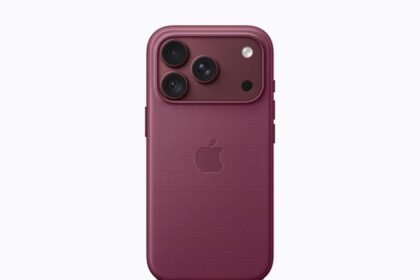 A burgundy iPhone 18 Pro with coordinating case is paired with a magenta Crossbody Strap.
