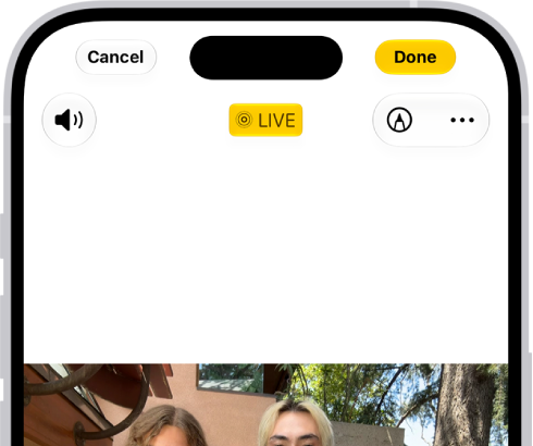 A Live Photo is open in the Photos app. Beneath the photo is the frame viewer with the Make Key Photo button active. On either end of the frame viewer are two arrows that allow you to trim the Live Photo. At the bottom of the screen are the Live, Adjust, Filters, and Crop buttons. The Live button is selected.