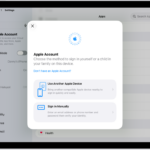 The Settings app, with the Apple Account sign-in dialog in the middle of the screen.