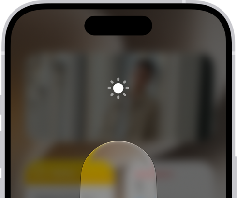 The iPhone Home Screen with Dark Mode on.