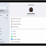 The Apple Account Settings shown with a list of options including—personal information, subscriptions, Find My, and more.
