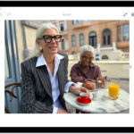 The Edit screen of the Photos app showing a photo in the center. To the left of the photo are the Adjust, Filters, and Crop buttons; Adjust is selected. To the right of the photo are buttons for editing effects and a slider to adjust each effect level.