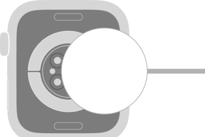 The concave end of the charger magnetically snaps to the back of Apple Watch.