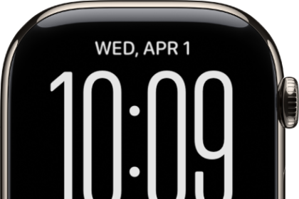 The Siri Modular watch face. The date appears at the top of the screen, followed by the time. Workout, Siri, and Music complications appear at the bottom of the screen.