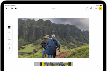 The Edit screen in the Photos app with a video playing in the center. The video's frame viewer is across the bottom of the video and a yellow outline is around the selected frames to include in the trimmed video. On the left side of the screen are the Video, Adjust, Filters, and Crop buttons; the Video button is selected.