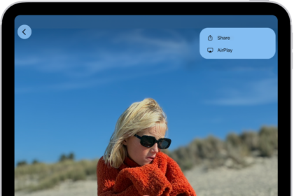 A slideshow in the Photos app plays on an iPad. At the top right of the screen is a pop-up menu, with an option to choose AirPlay.