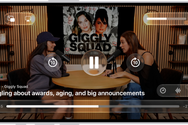 A video podcast in the Podcasts app expanded to full-screen video mode. At the top of the screen are display options and the volume control. The Skip Back, Pause, and Skip Forward buttons appear in the center of the screen. Episode details, the progress bar, and controls for playback speed, enhanced dialogue, and subtitles appear at the bottom of the screen.
