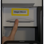 The Magnifier app detecting a finger pointing at text on a wall.