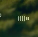 The top-right part of Control Center on Apple TV 4K. AirPods appear to the right of the time.