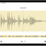 A recording is being edited, with the yellow trim handles enclosing a portion of the audio waveform at the bottom of the screen. To the left of the Playback controls are the Trim button (for deleting the part of the recording outside the handles) and the Delete button (for deleting the part of the recording outside the handles).