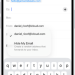 A draft email being composed. The From field is selected with two options listed below it—a personal email address and Hide My Email.