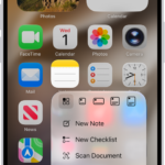 A blurred Home Screen, with the Camera Quick Actions menu showing below the Camera app icon.