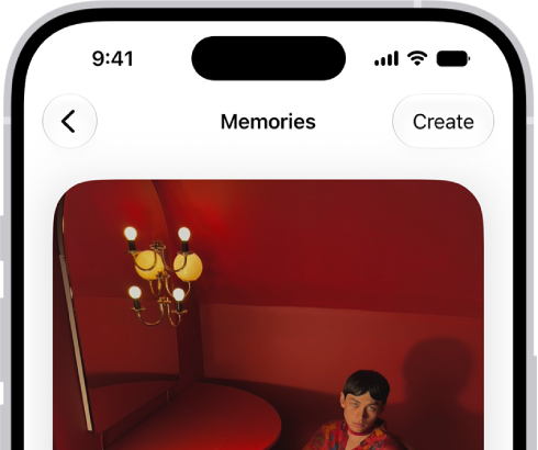 The Photos app is open to the Memories collection.
