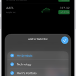 A list of customized watchlists in the Stocks app: My Symbols, Mom's Portfolio, Sustainability, and Entertainment.