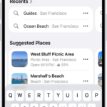 The Maps app showing the search field, categories for nearby services, and city guides. In the bottom part of the screen is the iPhone onscreen keyboard.