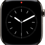 A red dot at the top center of the watch face, indicating unread notifications.