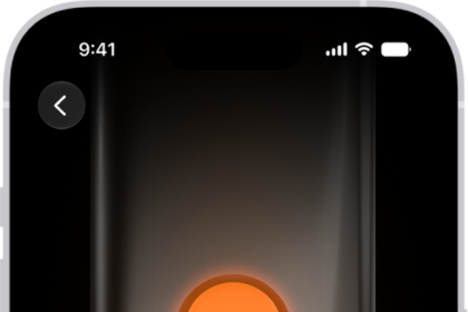 The screen for customizing the Action button. The Camera is the selected action. Other features appear to the right and left of the camera, including Do Not Disturb and Flashlight. Below the actions are dots you can tap to switch to another action. Below the selected action, Camera, is a menu of Camera options you can tap to assign to the Action button.