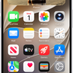 The iPhone Home Screen showing a FaceTime video call notification from an iPad at the top. Tap the Switch button to the right of the notification to move the call to your iPhone