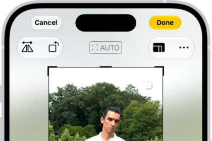 The Edit screen with a photo in the center. At the bottom of the screen, from left to right, are the Portrait, Adjust, Filters, Crop, and Clean Up buttons. The Crop button is selected and there is a slider to adjust the geometry enhancements.