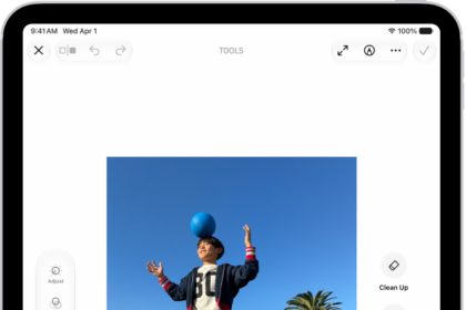 The buttons for Clean Up, Extend, and Reframe are displayed next to a photo.