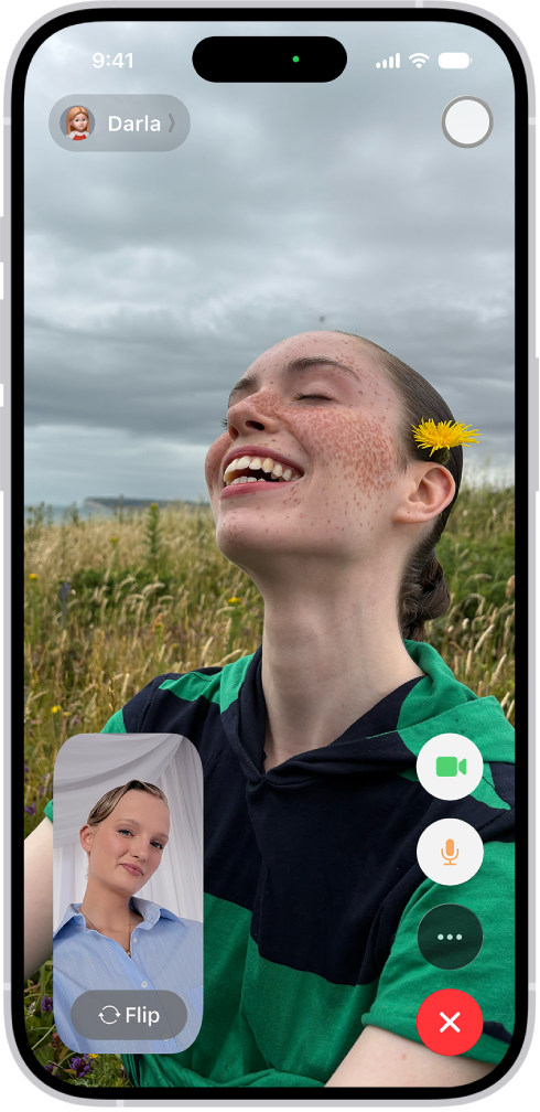 The FaceTime screen showing a call in progress. At the top of the screen is the name of the participant shown in the larger image. The other participant's image appears in a small rectangle in the lower left, along with the Flip Camera button. The images of the other participants appear in tiles above it. Additional FaceTime controls are at the bottom right of the screen: Camera, Microphone, More, and End Call buttons.