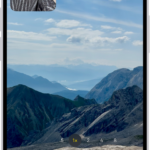 The Camera in Video mode recording a Dual Capture video. A window in the top-left of the frame displays what the front-facing camera is recording, and the rest of the frame displays what the back camera is recording.