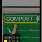 The Magnifier app detecting a finger pointing at text on a sign.