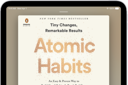 The audiobook player screen showing, from top to bottom, the audiobook cover, the name of the section that's playing, the playhead, pause button, and the skip forward and back buttons. At the bottom is the volume slider and below that are buttons for controlling playback speed, setting a sleep timer, choosing a playback destination, and viewing a list of the book's tracks.