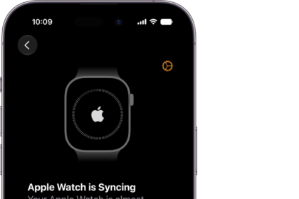 An iPhone and Apple Watch showing their syncing screens.