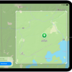 An iPad with a map of a national park. The park is framed by a rectangle with handles, which can be moved to change the size of the map to download. The selected map's download size is indicated near the bottom of the map. The Cancel and Download buttons are at the bottom of the screen.