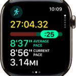 The Workout app on Apple Watch showing the Pacer view in an Outdoor Run workout. At the top is the duration of the run. Below is a slider indicating how far or behind you are in your pace. Average Pace, Current Pace, and distance are below.